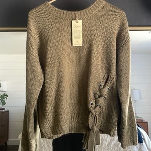 Natural green colored sweatshirt with thick stitching and pretty details. New!